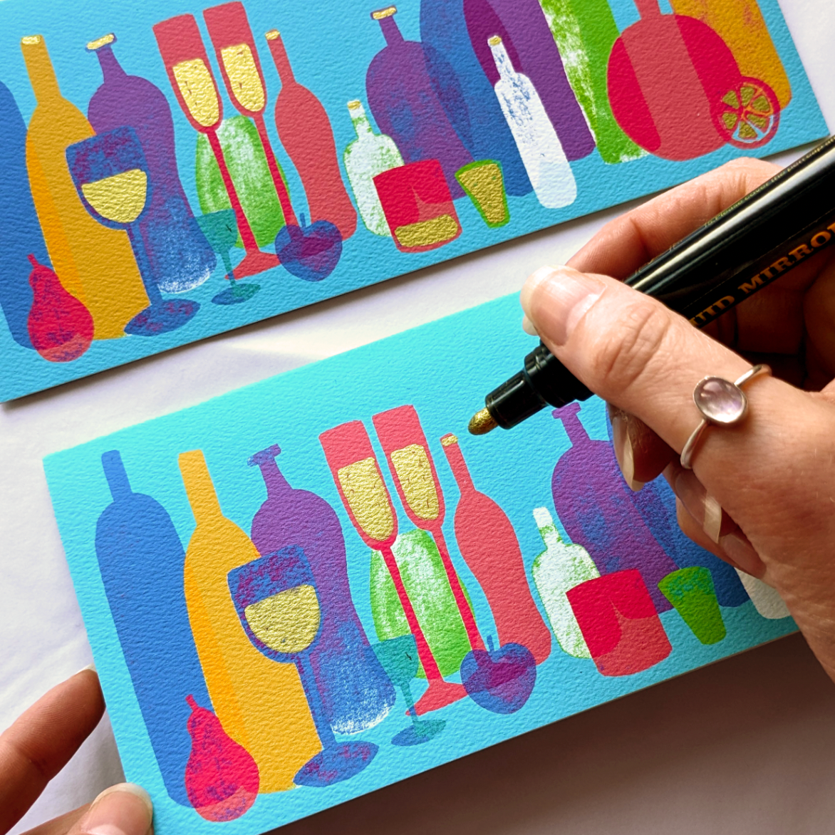 Bottles celebration greetings card featuring an array of different shaped bottles, hand detailed with gold paint. Perfect for celebrations, dads, drinks connoisseurs, birthdays, saying thank you and congratulations. 21cm x 10cm, DL in size and printed on premium quality 300gsm card stock. Designed by luxury gifts and stationery brand, Bella & The Moon.