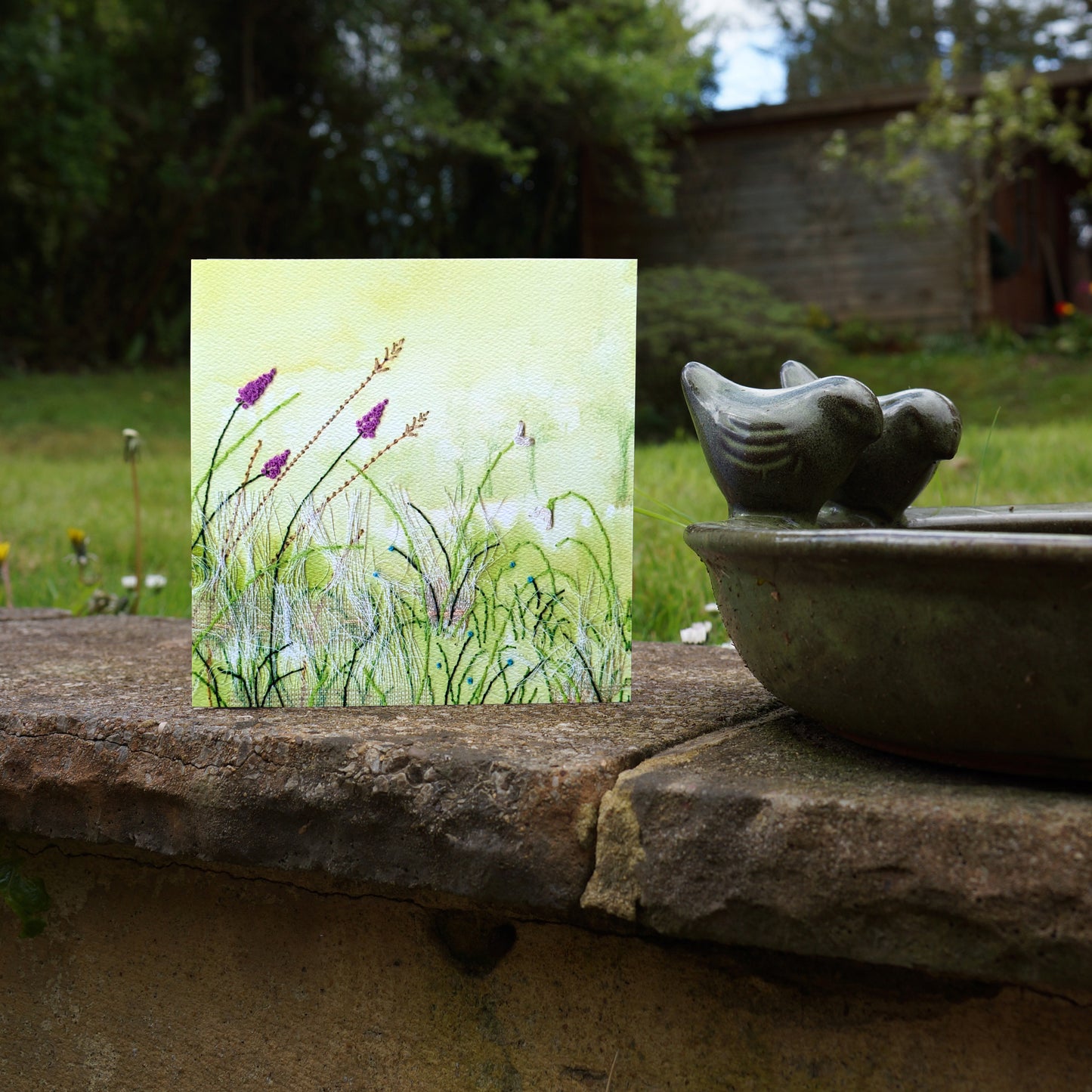 If Smiles Were Sunflowers, sunshine greetings card. Featuring a nature themed, green field, embroidery illustration. Perfect for stationery lovers, nature lovers, embroiders, art lovers, to say thank you, birthdays or just because. 14cm x 14cm, square in size and printed on premium quality 300gsm card stock. Designed by luxury gifts and stationery brand, Bella & The Moon.