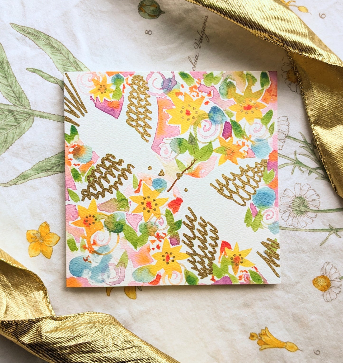 Hand detailed with gold, this floral, Dove greetings card features two white doves exchanging an olive branch. Symbolic of love and unity. Perfect for engagements, weddings, Valentine's Day, anniversaries, Birthday's, cards for siblings, cards for best friends, and Mother's Day. Size 14 x 14cm and printed on premium quality 300gsm card. Designed by luxury gifts and stationery brand, Bella & The Moon.