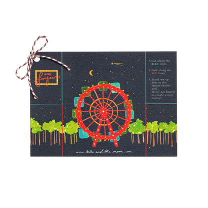 A decorative set of pop-up funfair cards with carnival-themed illustrations on a white background. Front cover. Kids crafts and gifts. Bella & The Moon gifts and stationery