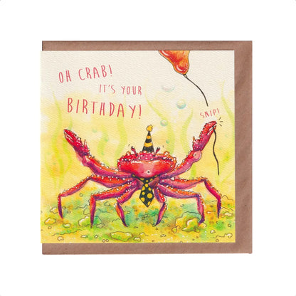 Birthday card featuring a car wearing a bow tie and party hat, accidentally snipping through the thread of his orange balloon. it features the text 'oh crab! It's your birthday!'. 14cm x 14cm, square in size and printed on 300gsm premium high quality card stock. Designed by luxury handmade gifts and stationery brand, Bella & The Moon.