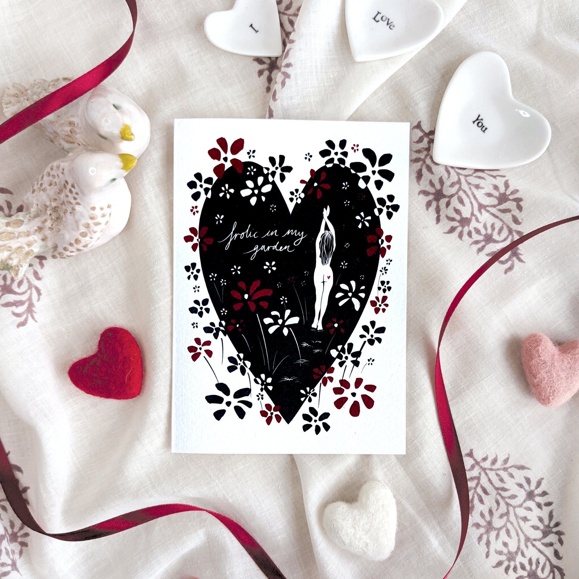 Frolic in my Garden Valentine's greetings card featuring a whimsical figure in a garden, perfect for romantic occasions, Valentine's Day, or anniversaries, A6 size, 300gsm premium card stock, designed by Bella & The Moon.