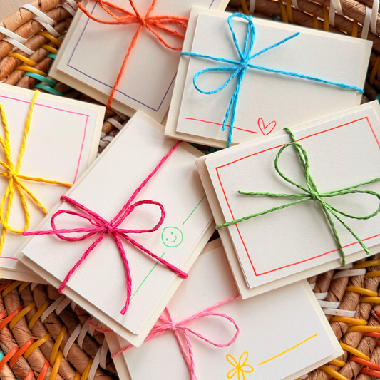 Hand detailed notecards tied with colourful string. Sets of 6 notecards and envelopes with hand detailed designs on each card. Gifts for birthdays or to send to friends. A7 in size. Bella & The Moon gifts and stationery