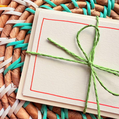Orange border, hand detailed notecards tied with green string. Sets of 6 notecards and envelopes with hand detailed designs on each card. Gifts for birthdays or to send to friends. A7 in size. Bella & The Moon gifts and stationery