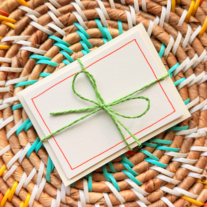 Orange border, hand detailed notecards tied with green string. Sets of 6 notecards and envelopes with hand detailed designs on each card. Gifts for birthdays or to send to friends. A7 in size. Bella & The Moon gifts and stationery