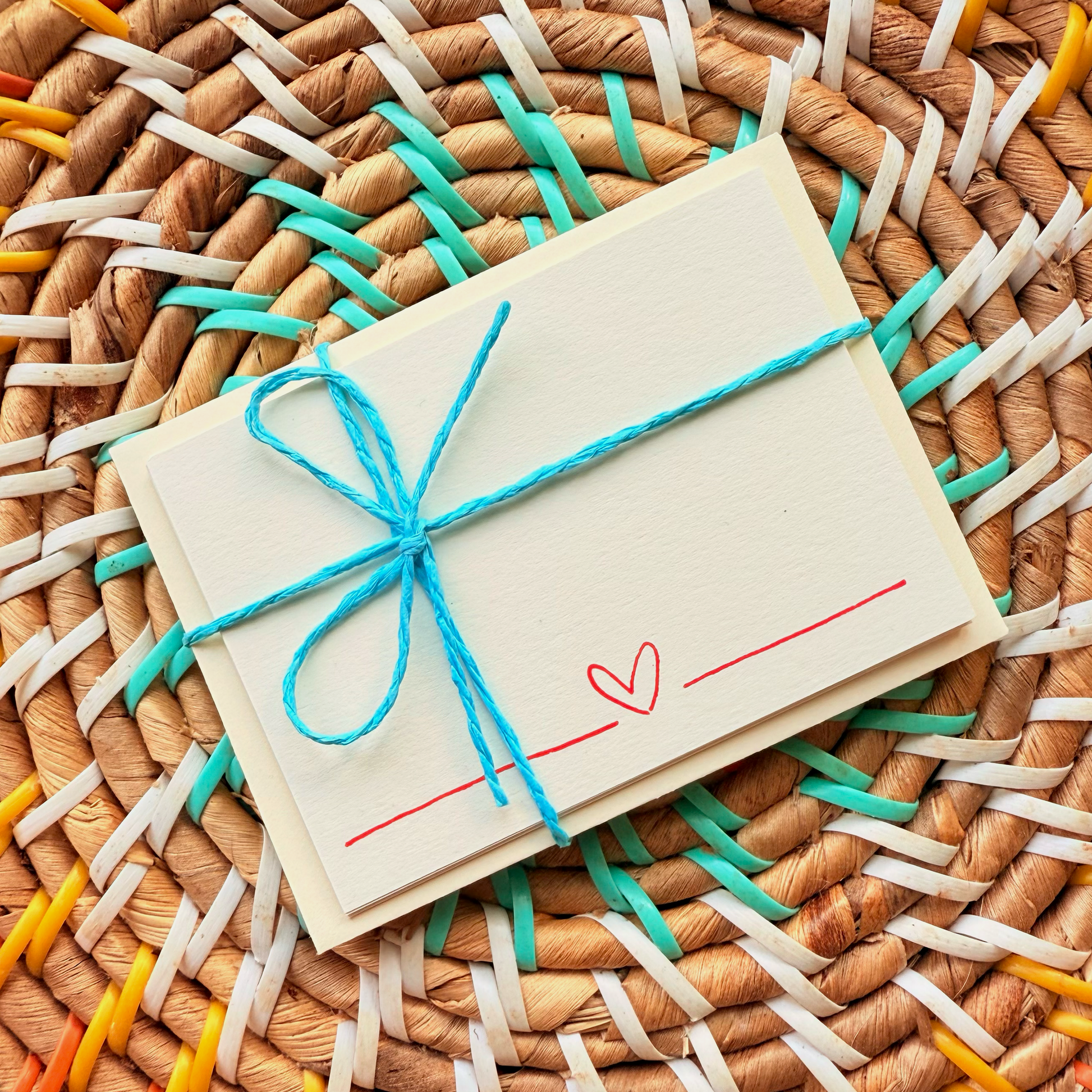 Red heart, hand detailed notecards tied with blue string. Sets of 6 notecards and envelopes with hand detailed designs on each card. Gifts for birthdays or to send to friends. A7 in size. Bella & The Moon gifts and stationery