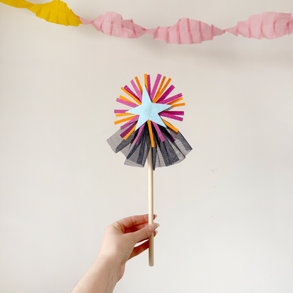 A handmade felt fairy wand featuring a blue star, pink details and blue sparkly netting. Great gifts for kids, dressing-up boxes, fancy dress and party bags. Bella & The Moon gifts and stationery.