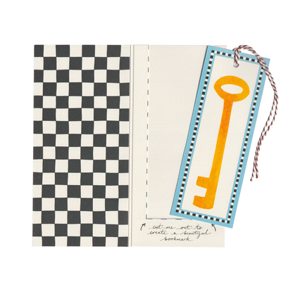 A heartwarming new home greetings card for home buyers. It features a house with a bicycle, lamppost and victorian pathway, on an extra special greeting card. The card includes a cut-out bookmark inside with a yellow key illustration. DL in size. Bella & The Moon gifts and stationery 