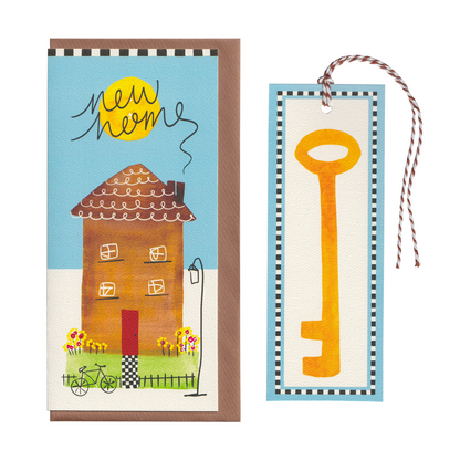 A heartwarming new home greetings card for home buyers. It features a house with a bicycle, lamppost and victorian pathway, on an extra special greeting card. The card includes a cut-out bookmark inside with a yellow key illustration. DL in size. Bella & The Moon gifts and stationery 