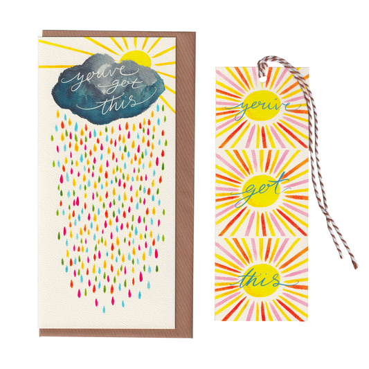 A heartwarming positive energy greetings card for friends and loved ones going through a hard time. It features a blue cloud with rainbow coloured raindrops and a sunshine. The card includes a cut-out bookmark inside with a colourful sunshine illustration and the words 'you've got this'. DL in size. Bella & The Moon gifts and stationery 